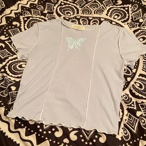 A blue graphic t shirt. Size s.